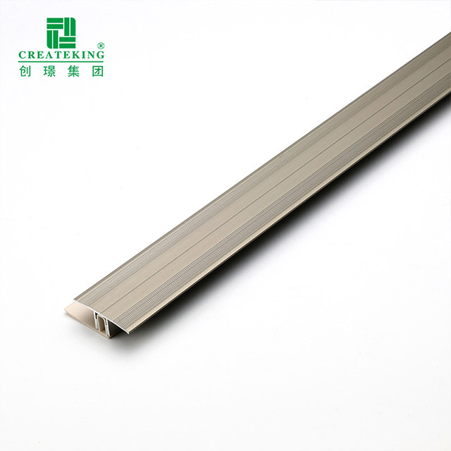 Bande de transition en aluminium pour plancher en T
